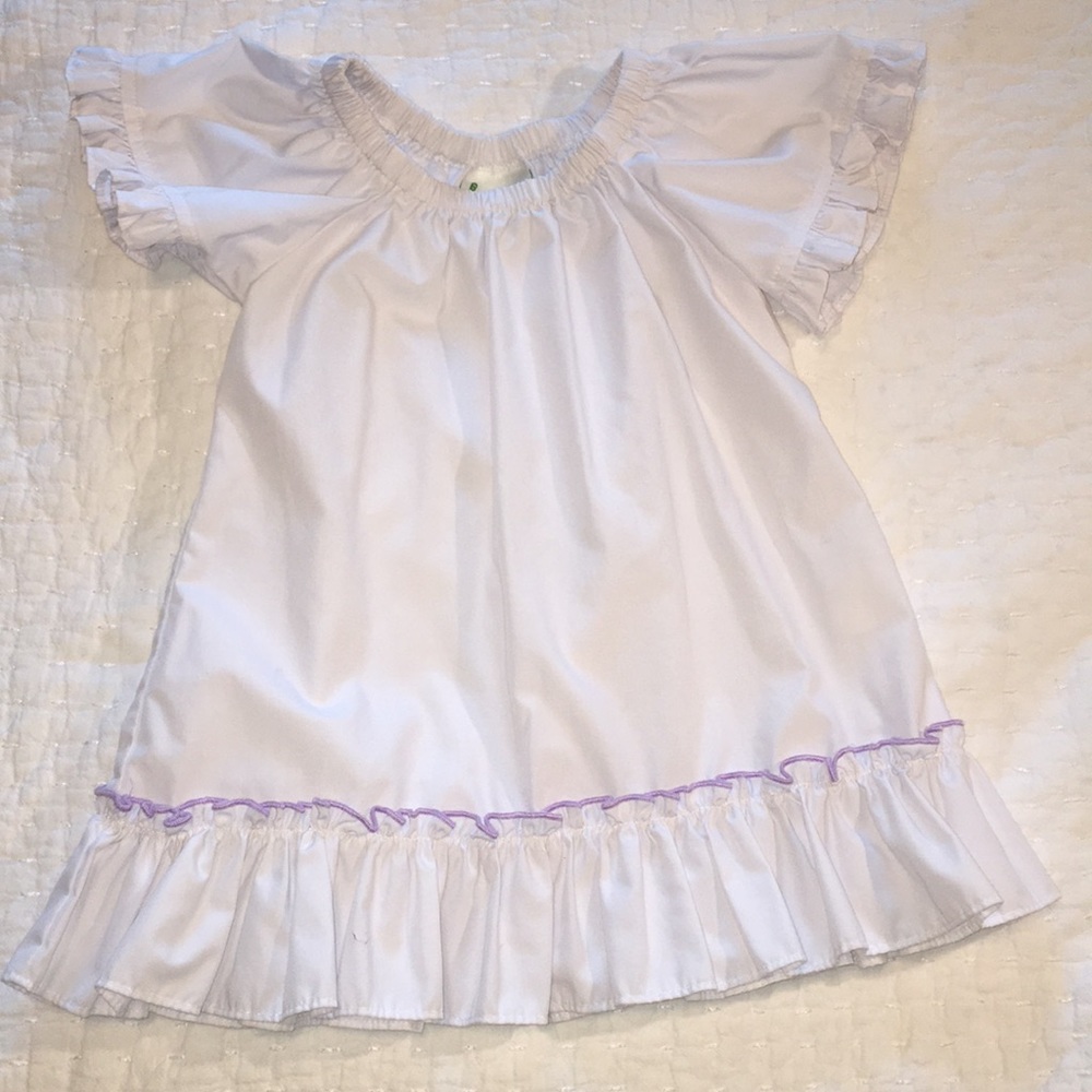 Boutique designer adorable shirt. Versitile!